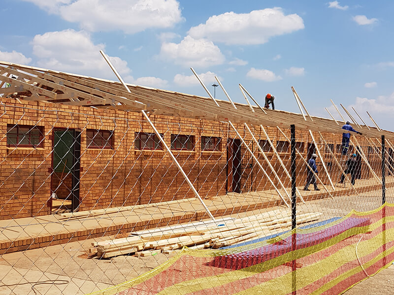 School roof replacement with new timber trusses and metal roof sheeting