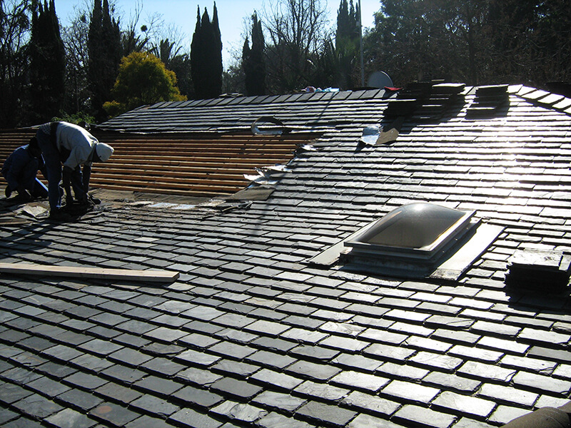 Roofing companies Johannesburg repairing slate roof