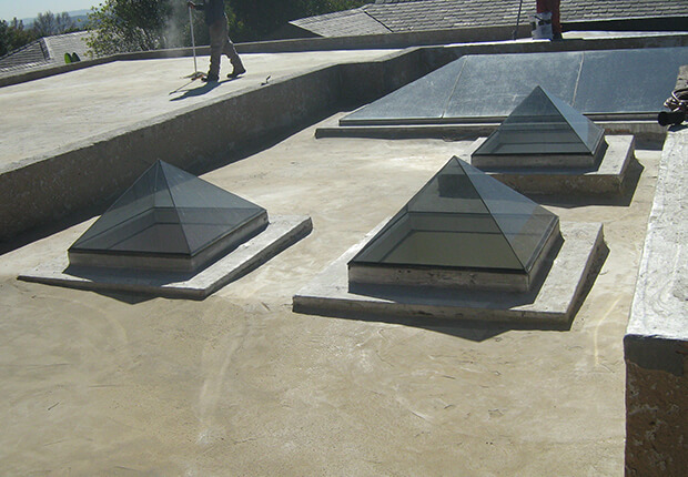 Torch-on waterproofing system protecting residential roof from leaks