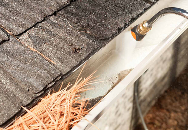 Downpipe cleaning service restoring proper rainwater flow