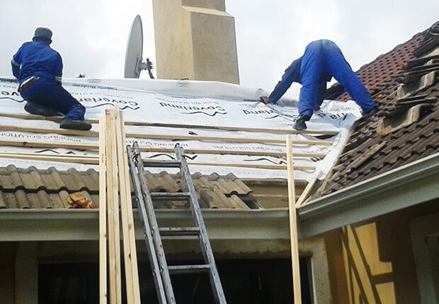 Repairing cracked roof tiles and damaged ridge capping